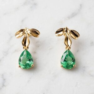 Aros dorados y cristal verde